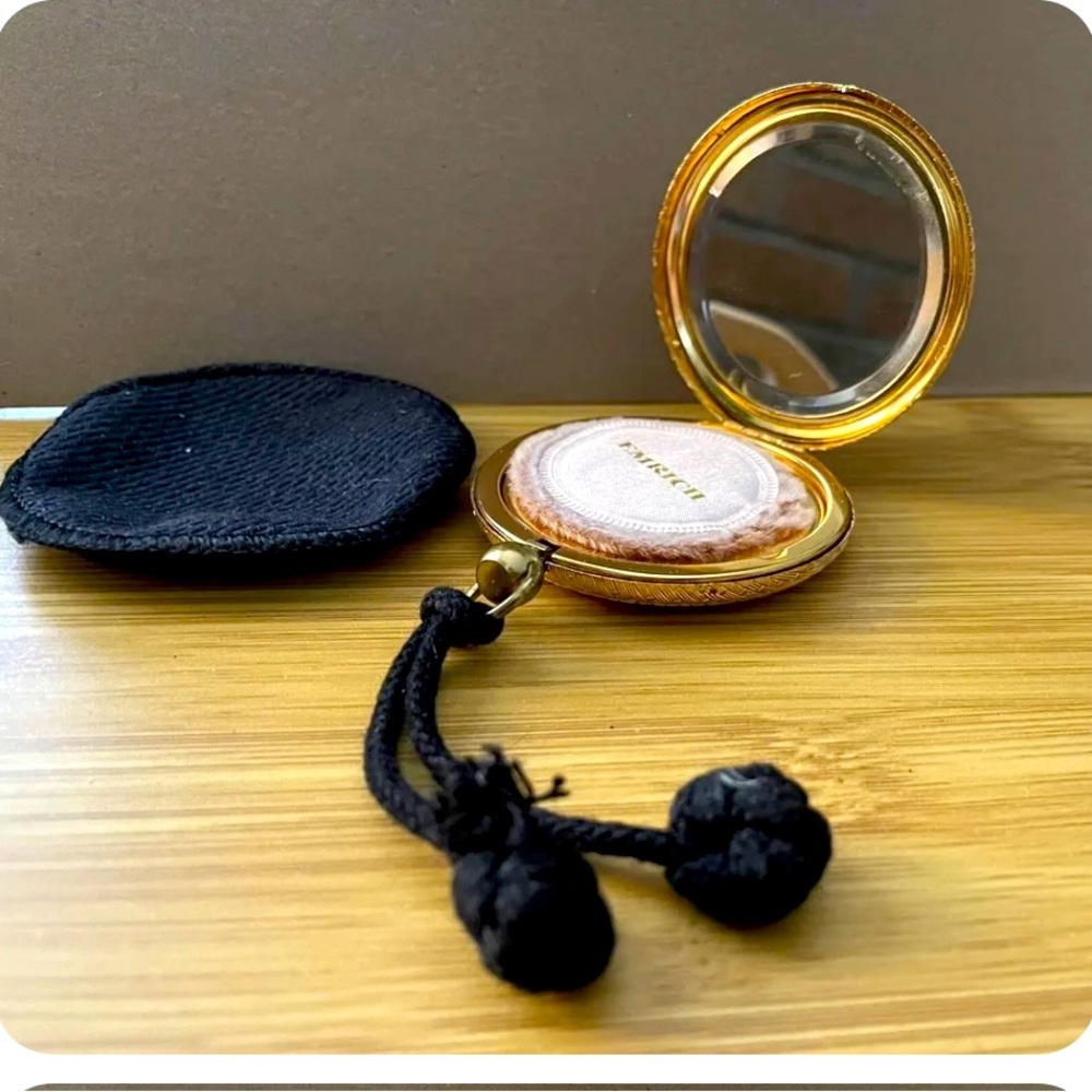 Vintage gold tone powder compact